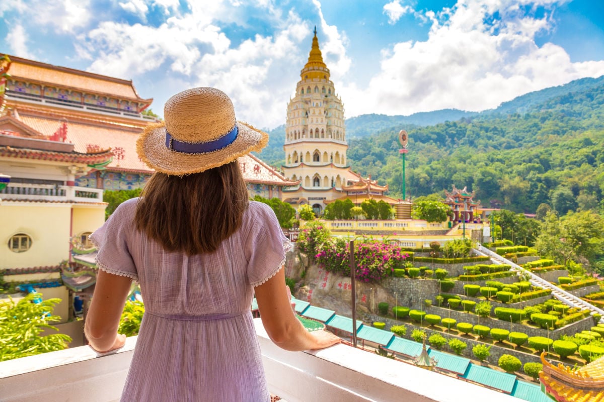 Female tourist visiting Kek Lok Si Temple in Penang